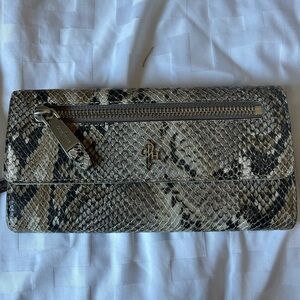 Cole Haan women's wallet in a faux snake skin print.
